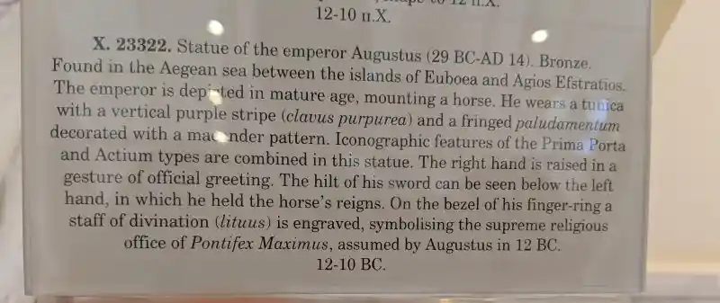 Close up of the bronze hand of emperor Augustus wearing a ring with religious symbols